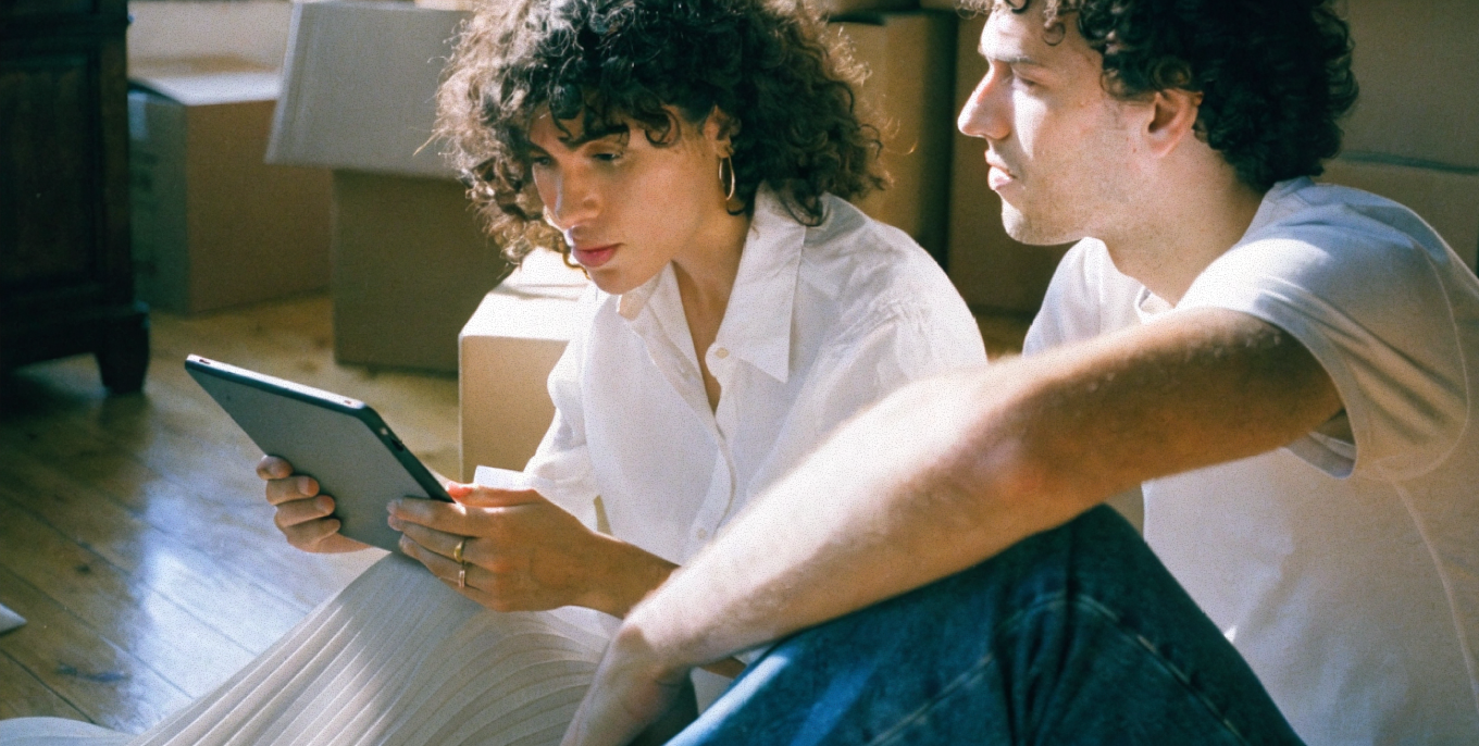 Business owner reviewing AI-handled customer messages at the office